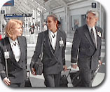 flight attendants walking through airport