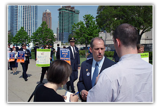 Flight Attendants Picket UAL Shareholder's Meeting