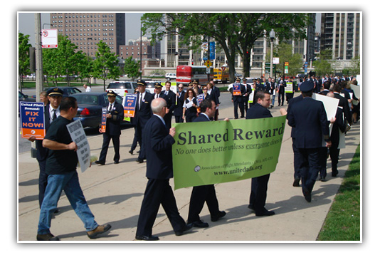 Flight Attendants Picket UAL Shareholder's Meeting