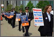Flight Attendants Picket UAL Shareholder's Meeting