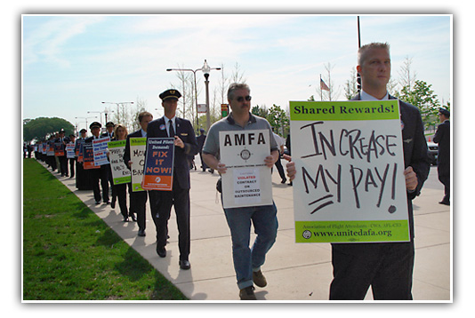 Flight Attendants Picket UAL Shareholder's Meeting